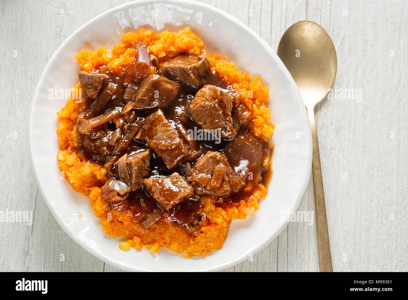 Beef in red onion gravy with veg crush. Chunks of tender beef in rich