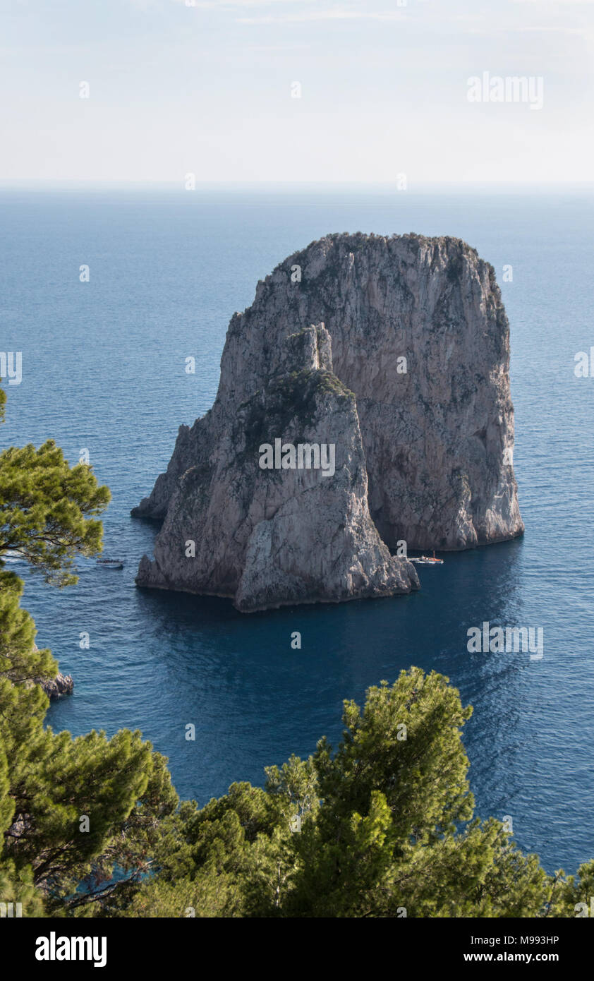 La Faraglioni limestone stacks off the southern coast of Capri Island, Italy Stock Photo