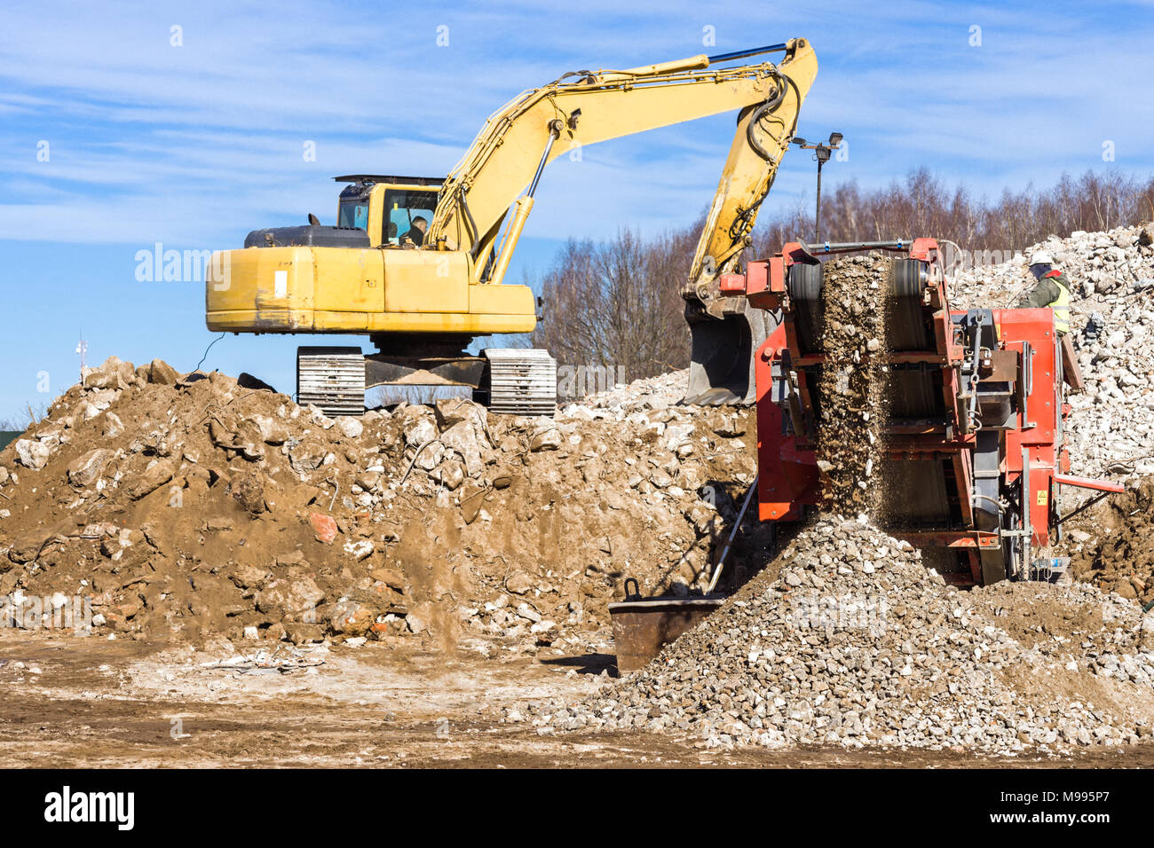 Crawler Mobile Crusher and excavator Crushing concrete Stock Photo Alamy