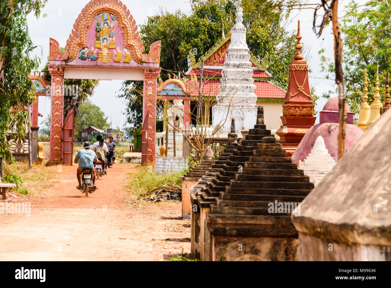Stupa, traditional Buddhist burial gravestones at a temple in a rural area of Cambodia Stock Photo