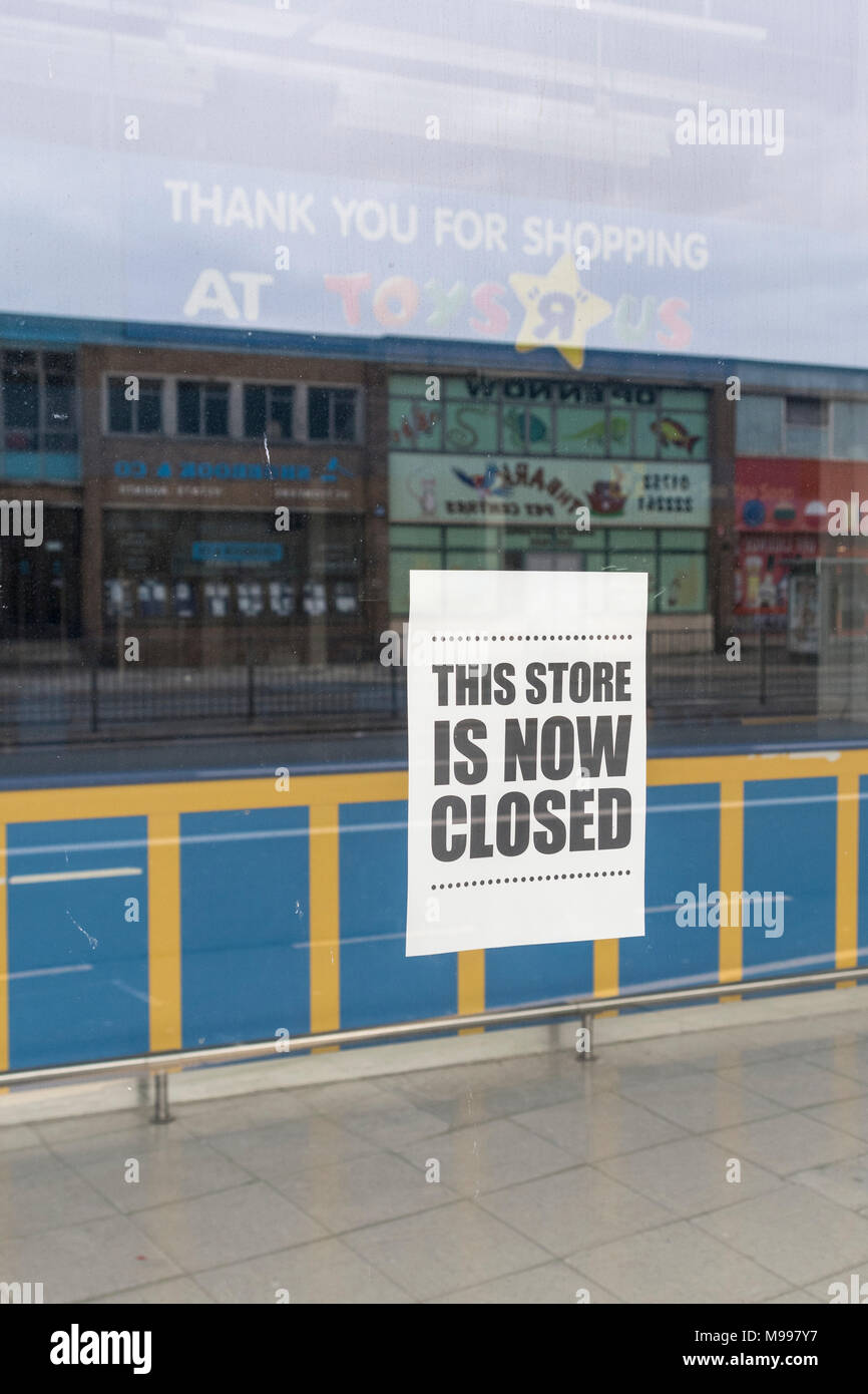 Front of closed Toys R Us shop in Plymouth, Devon. Metaphor high street retail casualties. high street crisis, death of high street, out of business Stock Photo