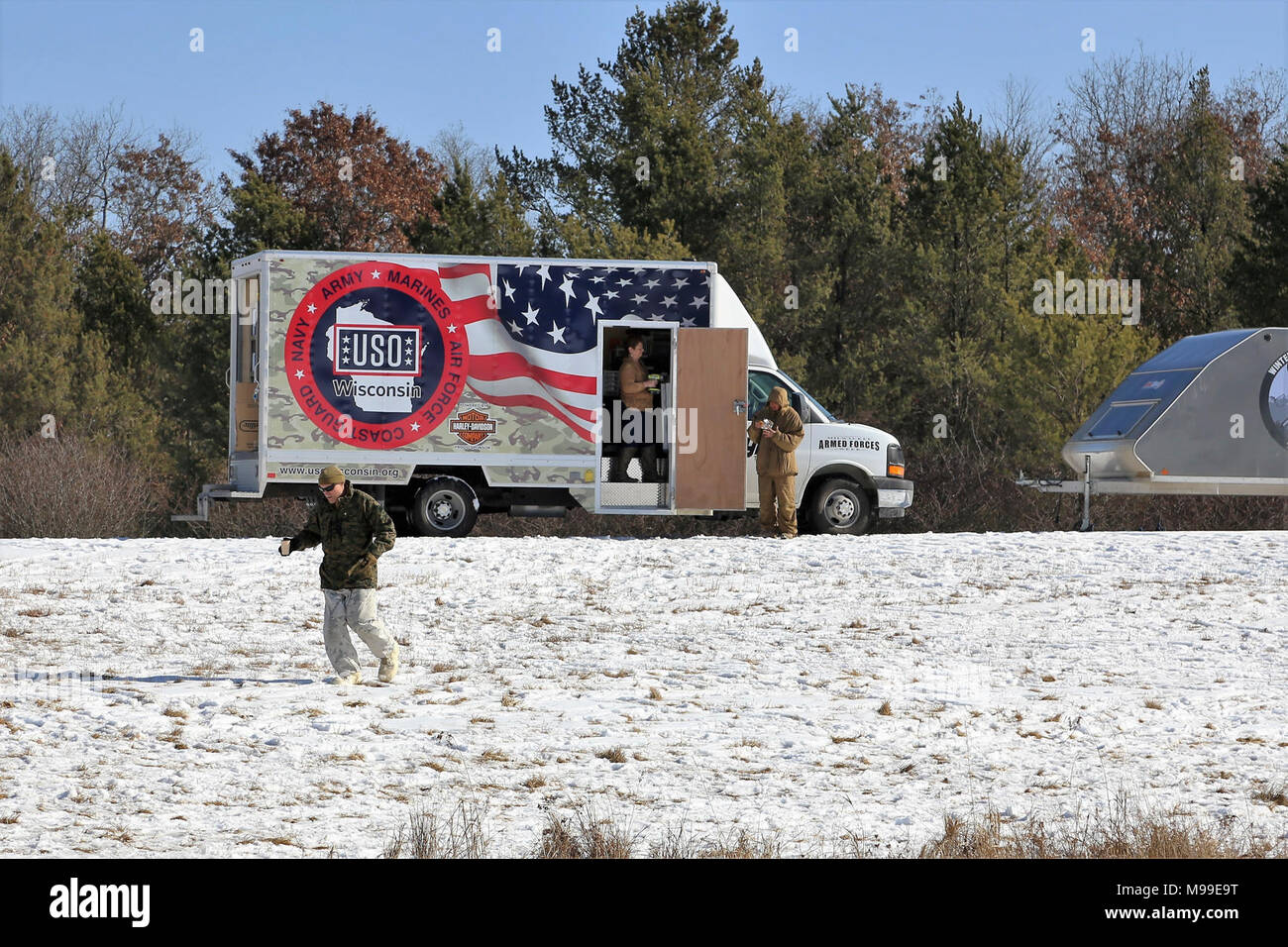 Service members at Fort McCoy, Wis., for training visit a mobile USO Wisconsin station/truck Feb. 14, 2018, on South Post at the installation. USO Wisconsin Inc. is a 501(c)(3) nonprofit organization. It currently operates six centers in Wisconsin that serve more than 25,000 military Families throughout the state. The USO has had a continuous presence in Wisconsin since 1943 through the global parent company, USO Inc. The truck is a recent new addition to USO support at the installation. (U.S. Army Stock Photo