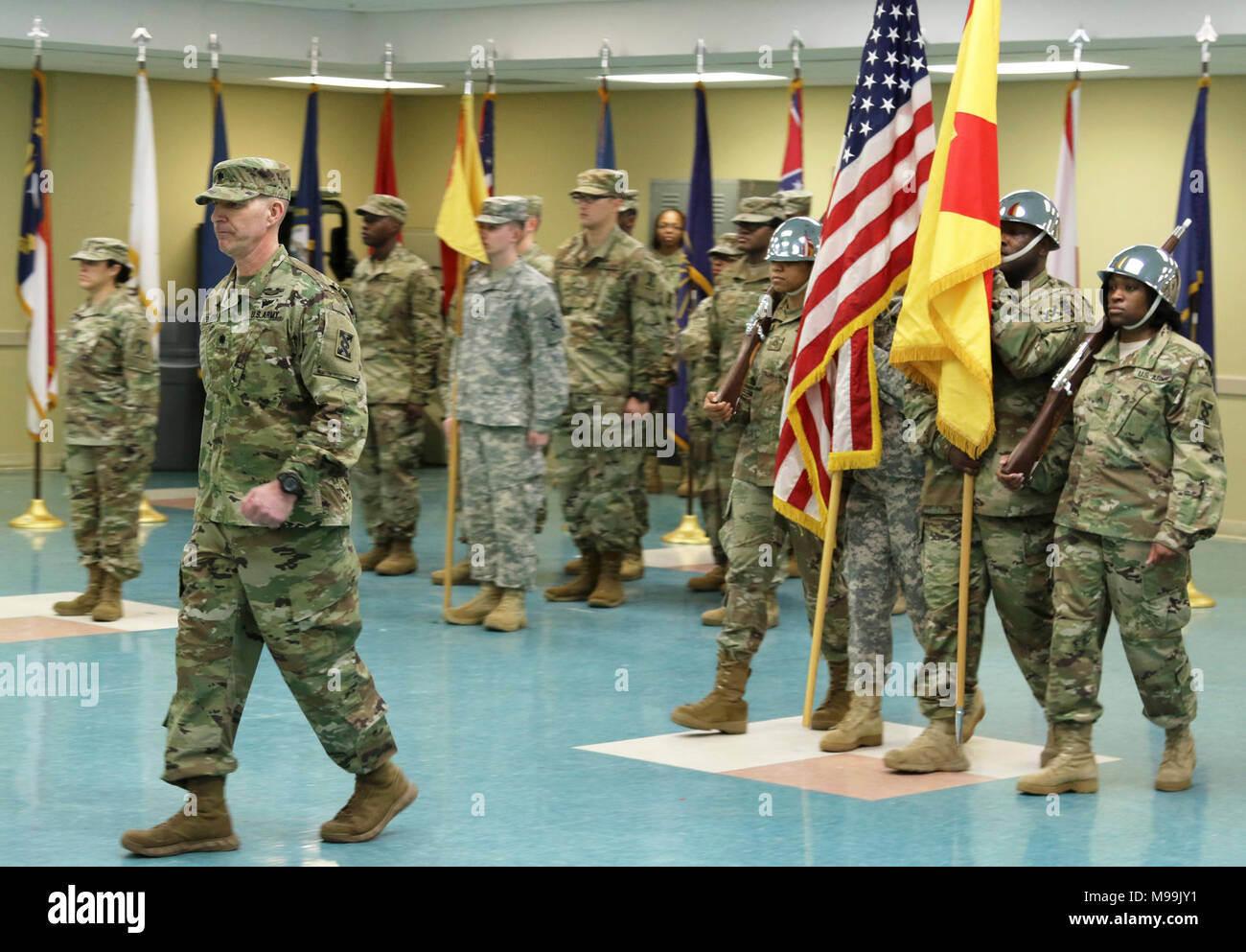 The 642nd Regional Support Group color guard moves forward during the