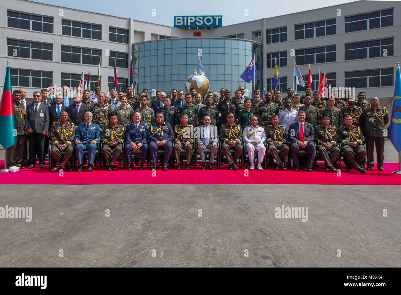Multinational military leaders and dignitaries gather after ceremony of ...