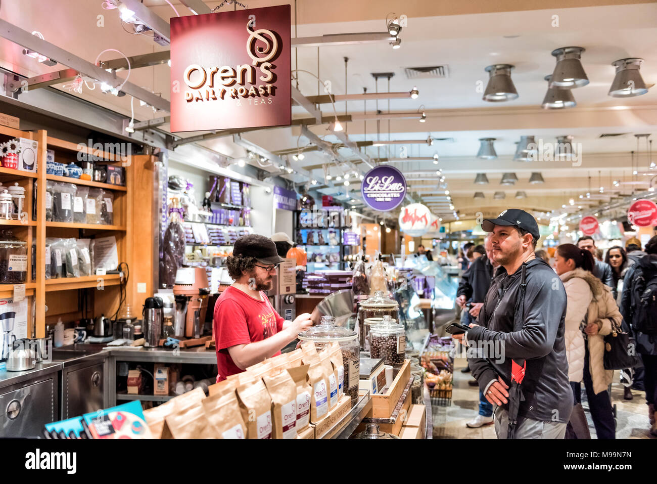 New York, USA - October 29, 2017: Grand Central Market in New York City with signs, people buying inside shops tea coffee Stock Photo