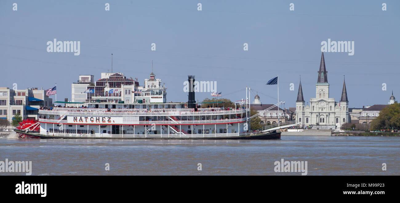 A paddlewheeler traveling down the Mississippi River passes St. Louis