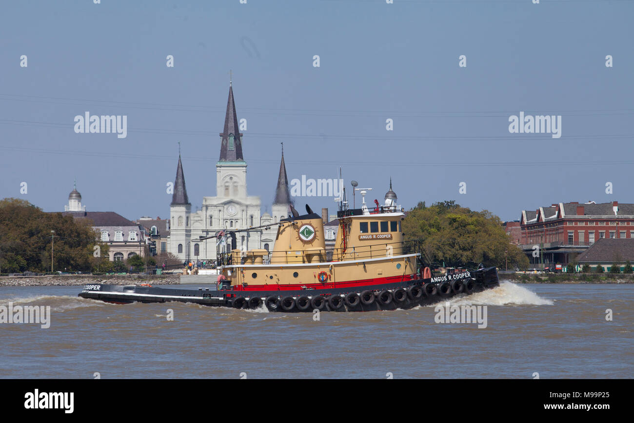 Ships traveling down the Mississippi River pass St. Louis Cathedral and