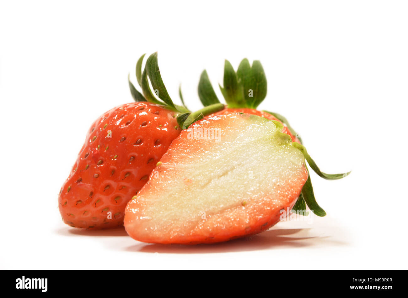 Strawberry fruits isolated on a white background Stock Photo - Alamy
