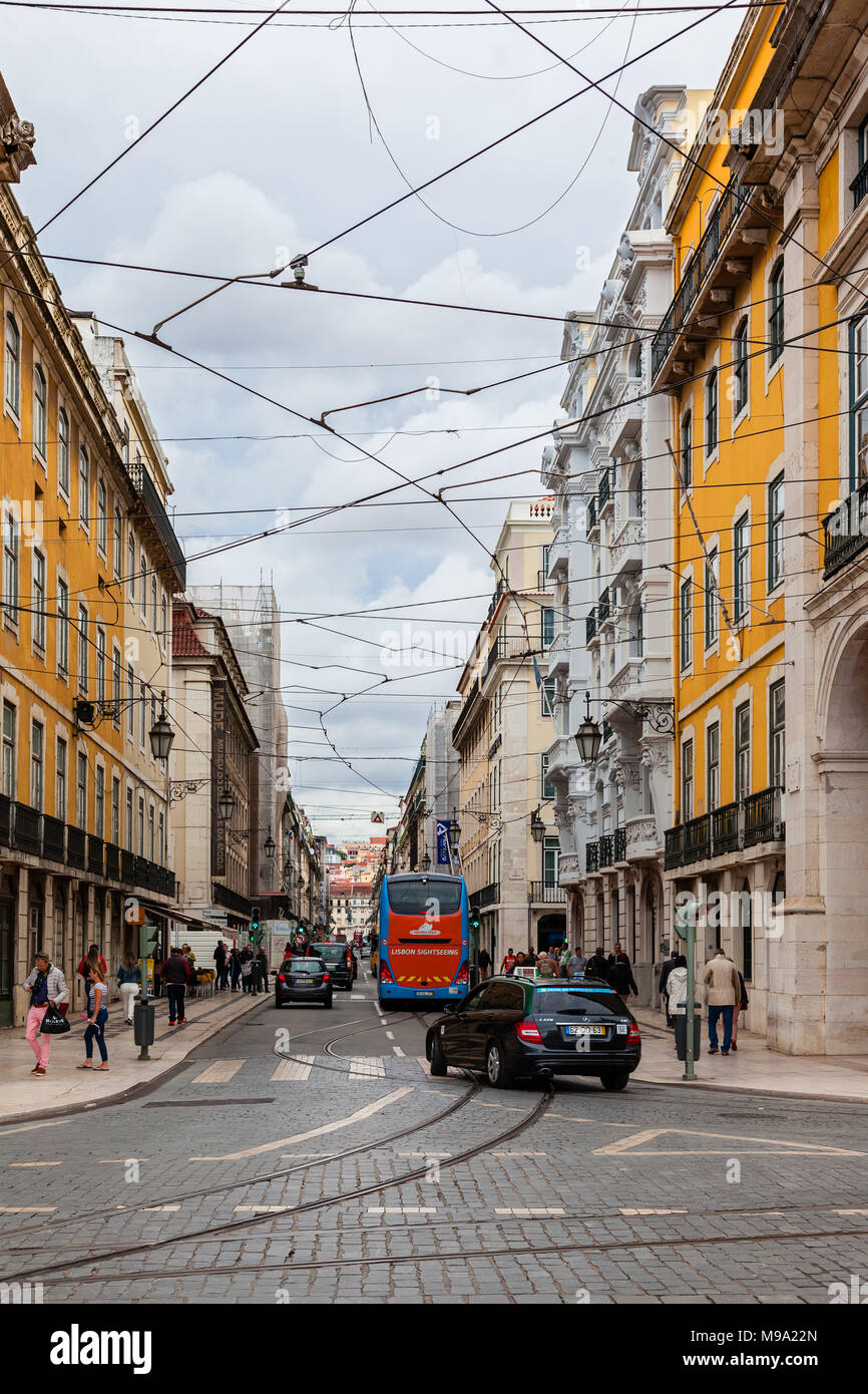 Lisbon, Portugal. Rua da Prata Street, Baixa District. Rails and overhead power cables for trams. Connects Praca do Comercio to Figueira Square Stock Photo