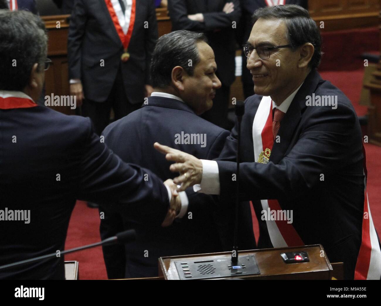 23 March 2018, Peru, Lima: Martin Vizcarra (R) after his swaring-in as head of state in the parliament. The 55-year-old took over the office after Kuczynski's withdrawal. Previously, the parliament had accepted Kuczynski's resign with a large majoraty. The current term goes until 2021. Photo: Juan Osorio/dpa Stock Photo