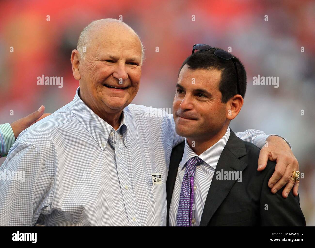 March 23, 2018 - FILE - HARRY WAYNE HUIZENGA (born: December 29, 1937 died: March 22, 2018) was an American businessman and entrepreneur. He was the owner of Blockbuster Video, AutoNation, Waste Management, Inc., the Miami Dolphins of the National Football League, the Florida Panthers of the National Hockey League, and the Florida Marlins of Major League Baseball. PICTURED: Sept. 28, 2011 - Miami Gardens, Florida, U.S. - Former owner Wayne Huizenga with Marlins president David Samson. (Credit Image: © Allen Eyestone/The Palm Beach Post/ZUMAPRESS.com) Stock Photo