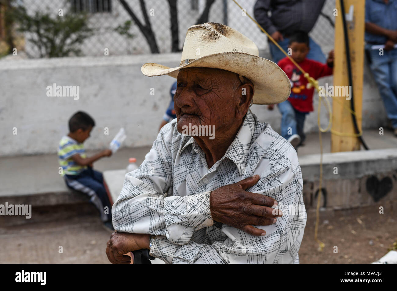 Colonia Gonzalez Ortega, Zacatecas, Mexico. 23rd Mar, 2018. Farmers listen to officials Friday as residents of rural Colonia Gonzalez Ortega, Zacatecas, rallied along with 20 other towns to become an independent municipality breaking out from Sombrerete in the hope of improving services such as water and infrastructure which are currently worse than some places in Sub-Saharan Africa. The central Mexican town is in many ways the quintessential Revolutionary Mexican town-- founded in 1928 -- and evolved into the ''grain silo'' of the country. It has suffered over the years due to half its pop Stock Photo