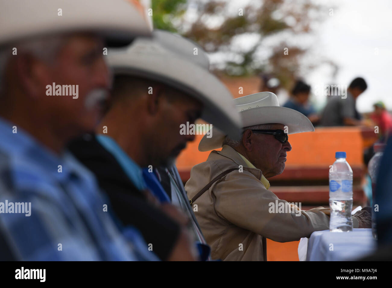 Colonia Gonzalez Ortega, Zacatecas, Mexico. 23rd Mar, 2018. Farmers listen to officials Friday as residents of rural Colonia Gonzalez Ortega, Zacatecas, rallied along with 20 other towns to become an independent municipality breaking out from Sombrerete in the hope of improving services such as water and infrastructure which are currently worse than some places in Sub-Saharan Africa. The central Mexican town is in many ways the quintessential Revolutionary Mexican town-- founded in 1928 -- and evolved into the ''grain silo'' of the country. It has suffered over the years due to half its pop Stock Photo