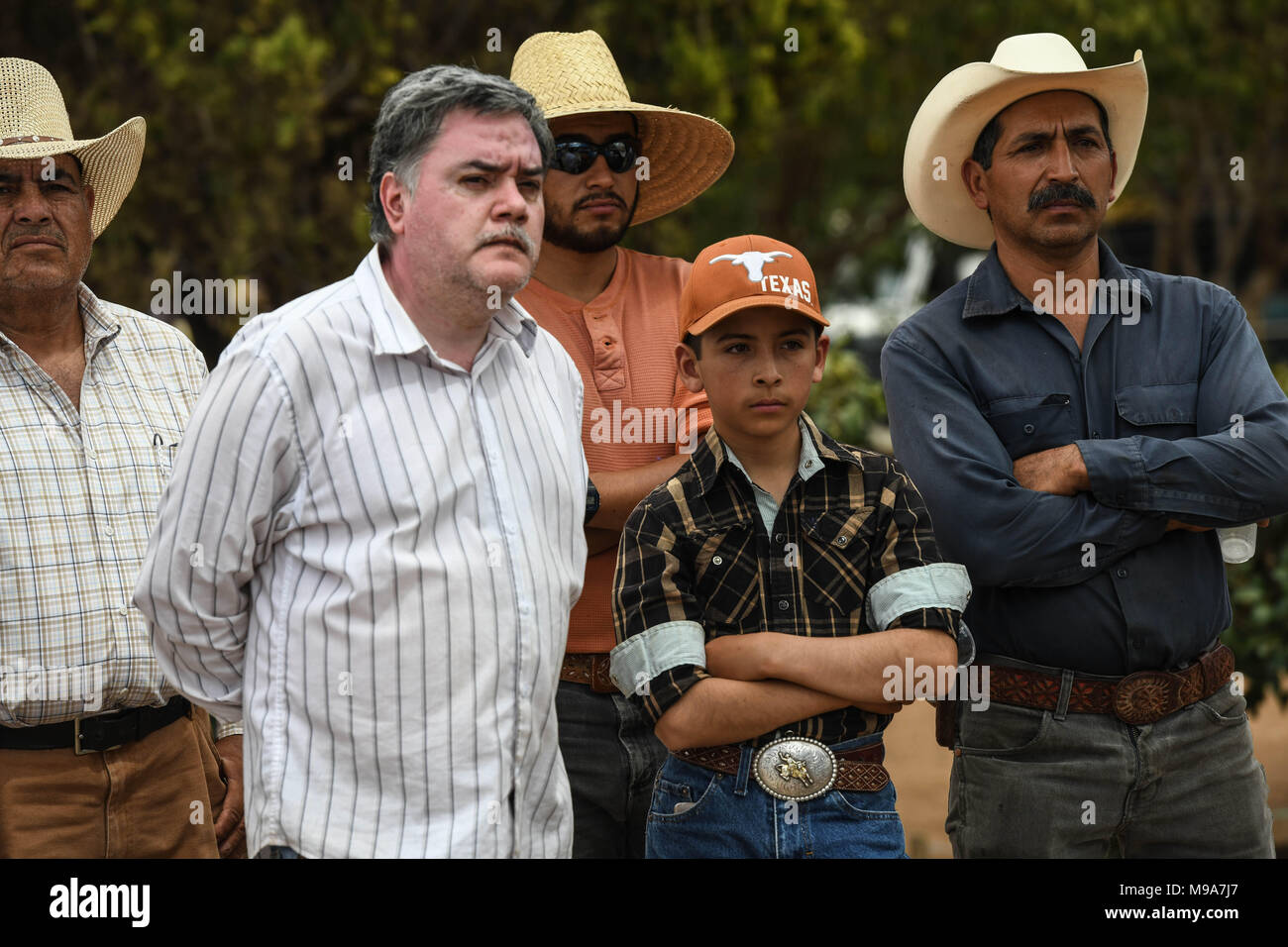 Colonia Gonzalez Ortega, Zacatecas, Mexico. 23rd Mar, 2018. Farmers listen to officials Friday as residents of rural Colonia Gonzalez Ortega, Zacatecas, rallied along with 20 other towns to become an independent municipality breaking out from Sombrerete in the hope of improving services such as water and infrastructure which are currently worse than some places in Sub-Saharan Africa. The central Mexican town is in many ways the quintessential Revolutionary Mexican town-- founded in 1928 -- and evolved into the ''grain silo'' of the country. It has suffered over the years due to half its pop Stock Photo