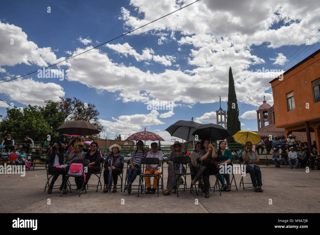 Colonia Gonzalez Ortega, Zacatecas, Mexico. 23rd Mar, 2018. Farmers listen to officials Friday as residents of rural Colonia Gonzalez Ortega, Zacatecas, rallied along with 20 other towns to become an independent municipality breaking out from Sombrerete in the hope of improving services such as water and infrastructure which are currently worse than some places in Sub-Saharan Africa. The central Mexican town is in many ways the quintessential Revolutionary Mexican town-- founded in 1928 -- and evolved into the ''grain silo'' of the country. It has suffered over the years due to half its pop Stock Photo