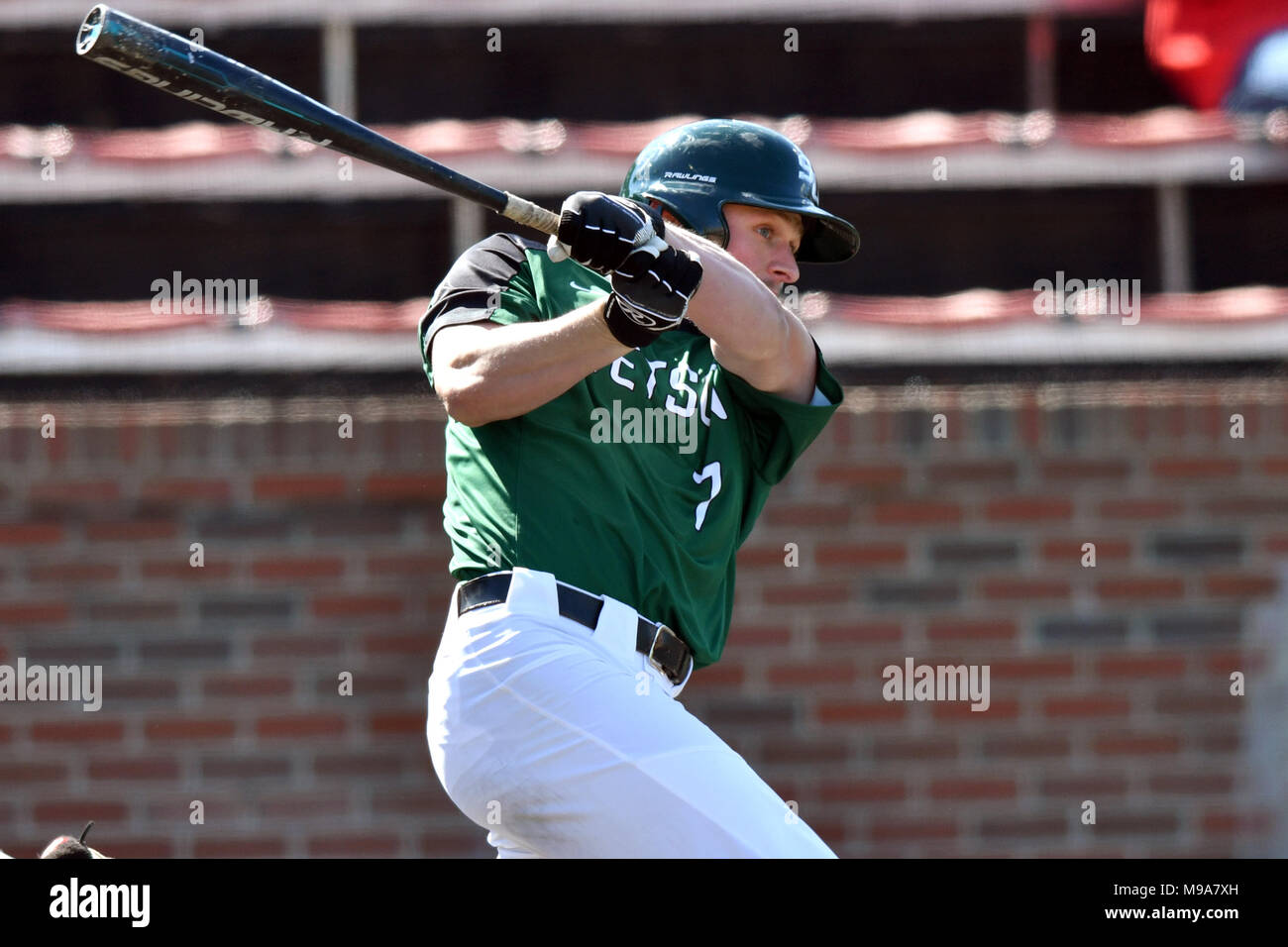 College Park, Maryland, USA. 23rd Mar, 2018. Stetson outfielder ANDREW MACNEIL (7) follows through on a swing during the NCAA baseball game played in College Park, MD. MACNEIL drove in 3 in the 12-3 Hatters win over the Terrapins. Credit: Ken Inness/ZUMA Wire/Alamy Live News Stock Photo