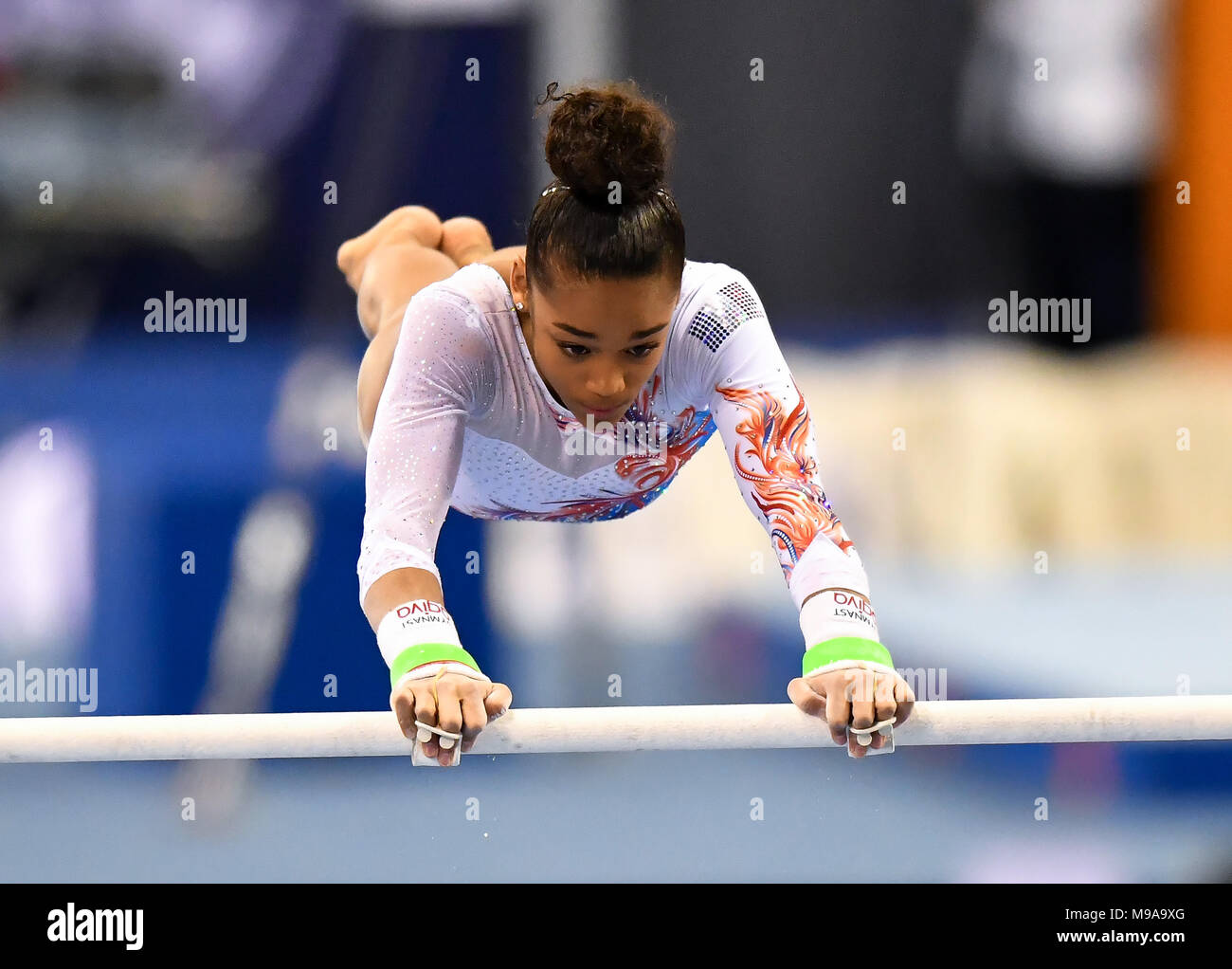 Doha, Qatar. 23rd Mar, 2018. Melanie de Jesus dos Santos of France competes during the Women's Uneven Bars final at the 11th FIG Artistic Gymnastics World Cup in Doha, Qatar, on March 23, 2018. Melanie de Jesus dos Santos took the bronze with 14.400 points. Credit: Nikku/Xinhua/Alamy Live News Stock Photo