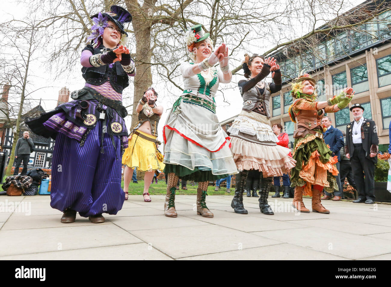 Women performing a steampunk dance. Steampunk is a style of fashion that combines historical elements and anachronistic technology, often inspired by Edwardian science fiction. Peter Lopeman/Alamy Live News Stock Photo