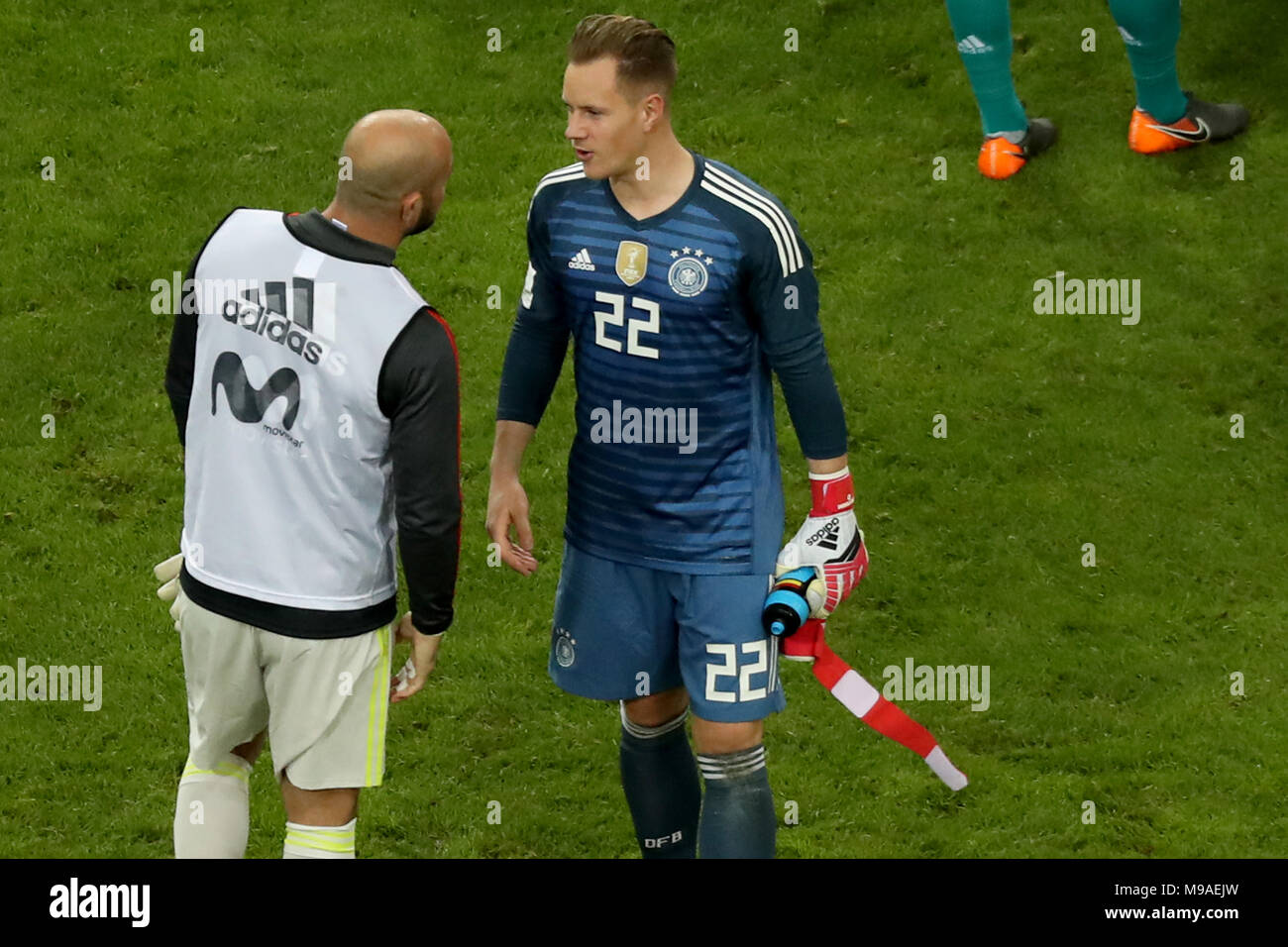 Soccer: Friendly match, Germany vs Spain, 23 March 2018 in the ESPRIT arena, Duesseldorf, Germany: Germany goalkeeper Marc-Andre ter Stegen (R) speaking with Spain's Pepe Reina after the game. Photo: Christian Charisius/dpa Stock Photo