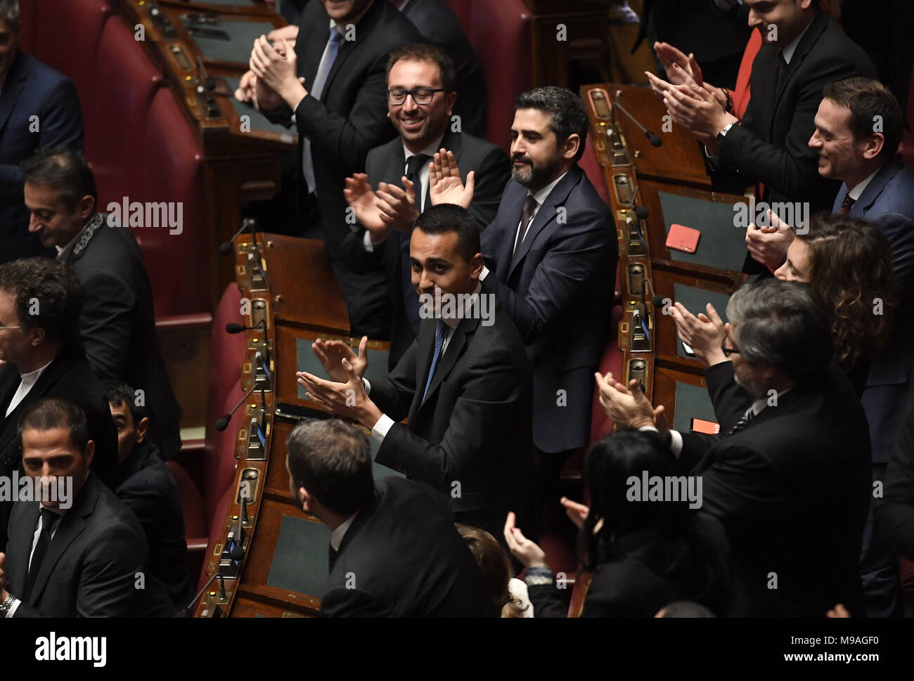 Rome. 24th Mar, 2018. Five Stars Movement members celebrate party member Roberto Fico being elected lower house speaker at the lower house of parliament in Rome, Italy, on March 24, 2018. Italy's center-right bloc and the anti-establishment Five Star Movement joined forces Saturday to elect a speaker for each chamber of parliament, in what could be a test run for a possible government alliance in the wake of an inconclusive March 4 general election. Credit: Xinhua/Alamy Live News Stock Photo