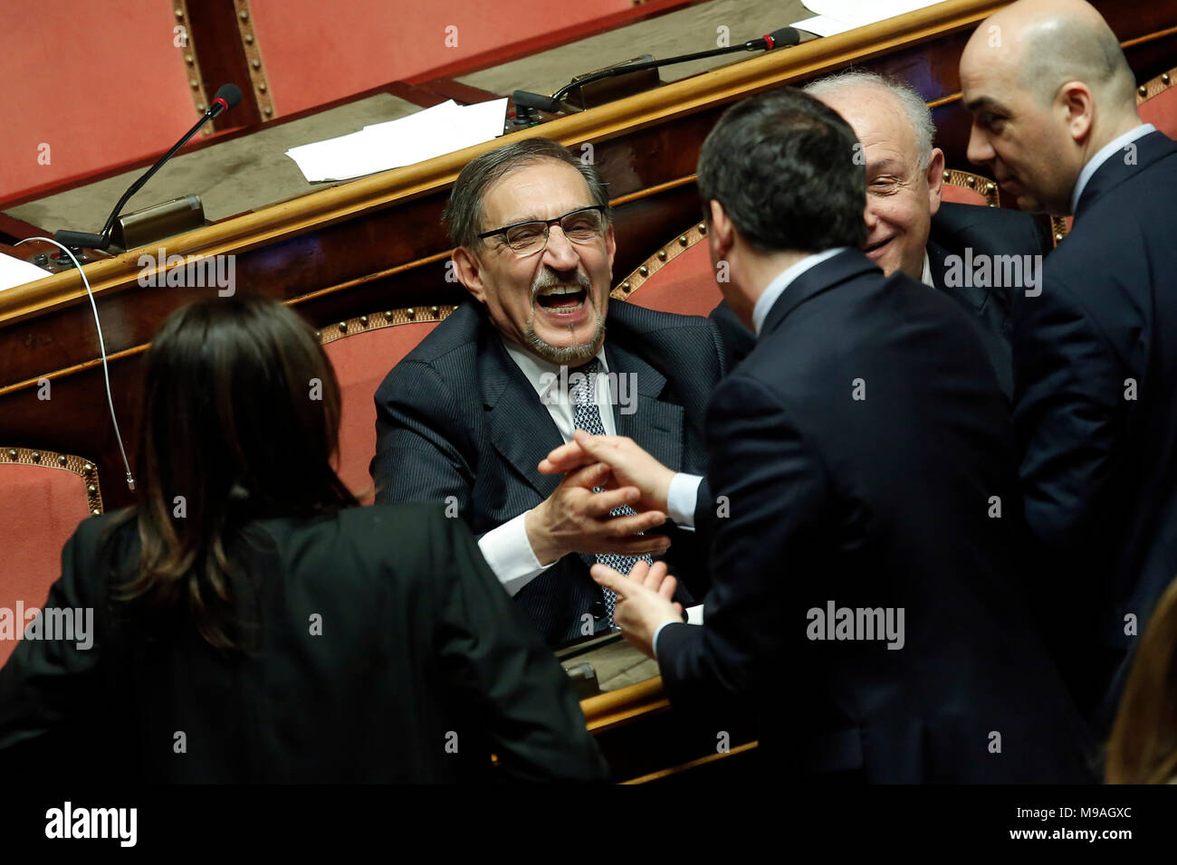 Rome, Italy. 24th March, 2018. Matteo Renzi scherza con Ignazio Larussa e altri senatori di Forza Italia  Roma 24/03/2018. Seduta al Senato con voto per eleggere il Presidente del Senato Rome March 24th 2018. Senate. Votation to elect the new President of Senate. Foto Samantha Zucchi Insidefoto Credit: insidefoto srl/Alamy Live News Stock Photo