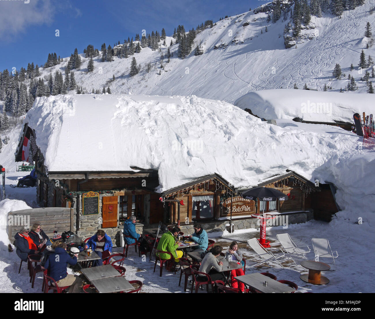 The busy ski resort of Chatel in the Portes du Soleil area of France, restaurants at Pre La Joux Stock Photo