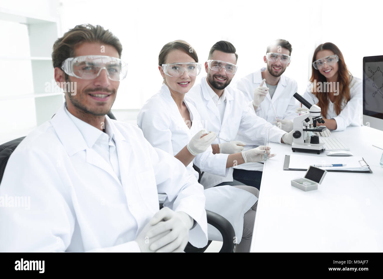 head of the scientific project and research team at the workplace Stock Photo