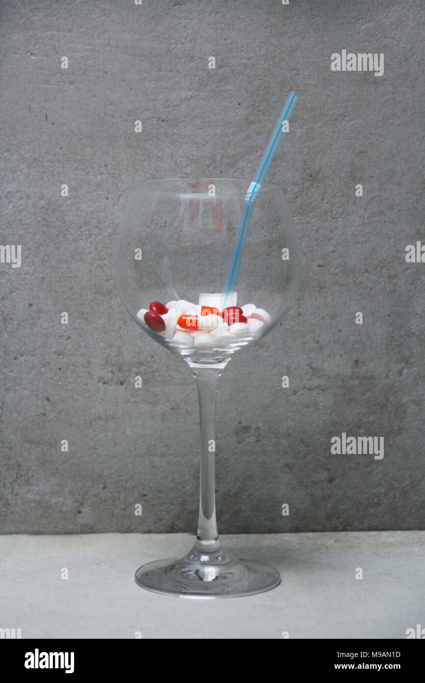 Drug cocktail, A combination of different tablets in a glass Stock