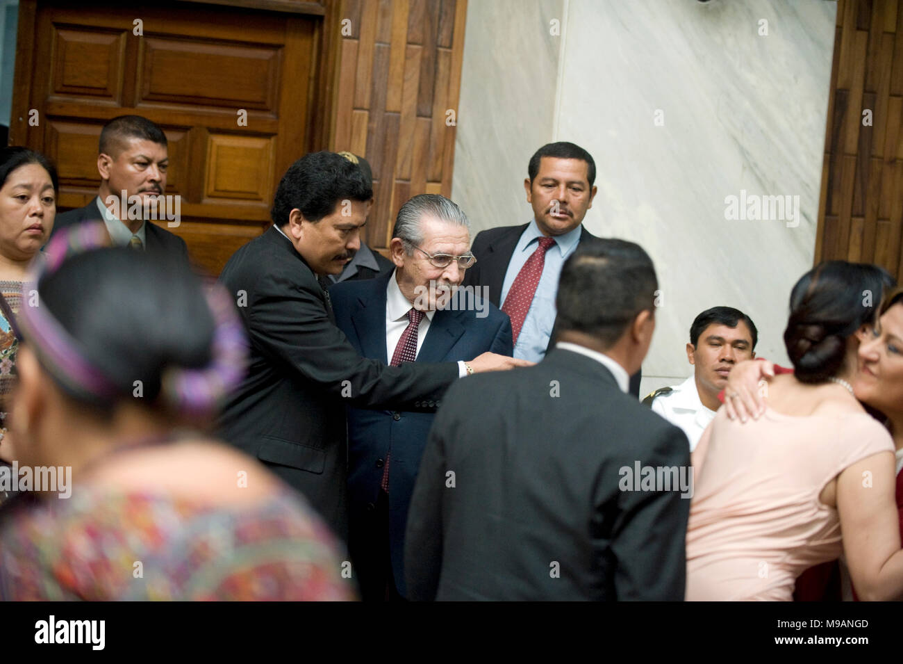 Former Guatemalan dictator Efrain Rios Montt enters the court as his genocide trial starts in the Supreme Court of Justice in Guatemala City March 19 2013. Montt is accused of charges of genocide and crimes against humanity during his 1982-1983 rule. Stock Photo