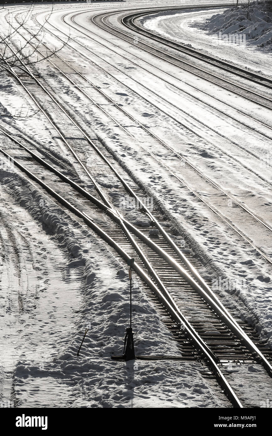 CPR railway yard switch in snow in winter at Revelstoke BC Stock Photo