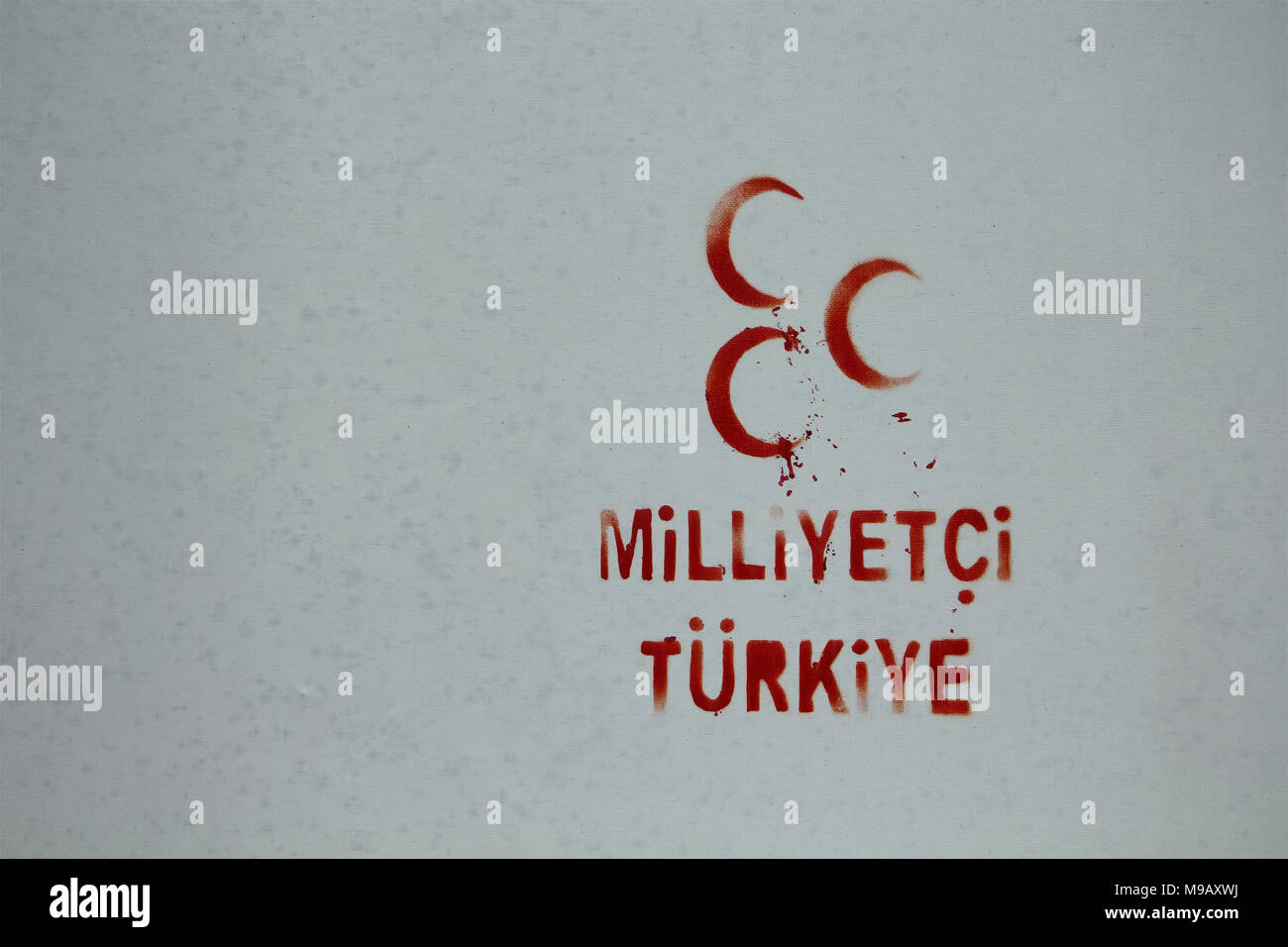 Emblem of the Turkish nationalistic party applied to white wall. Stock Photo