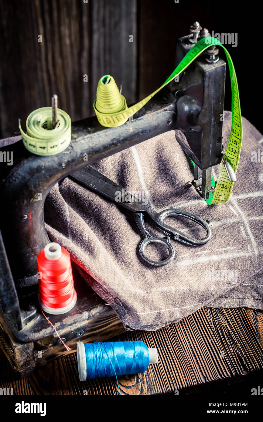 Tailoring Material Machine Tailor's machine with scissors, cloth and threads Stock Photo - Alamy