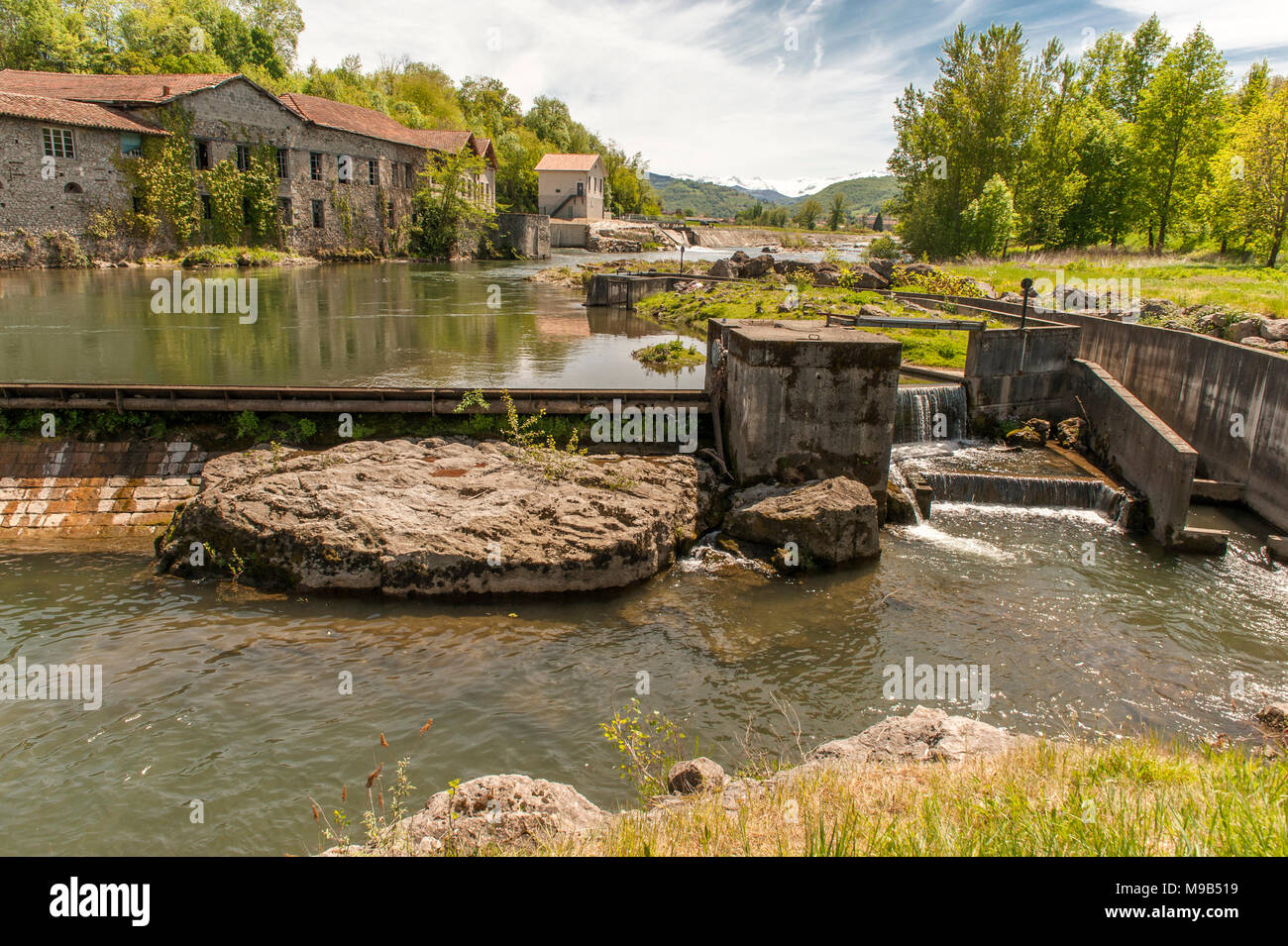 The Salat river flowing through the historic town of Saint-Lizier in southern France Stock Photo