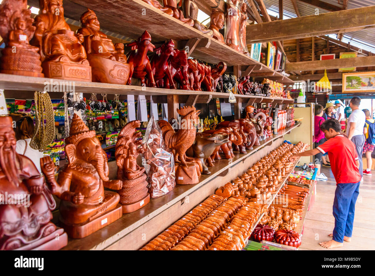 Carved wooden souvenirs for sale in Cambodia Stock Photo Alamy