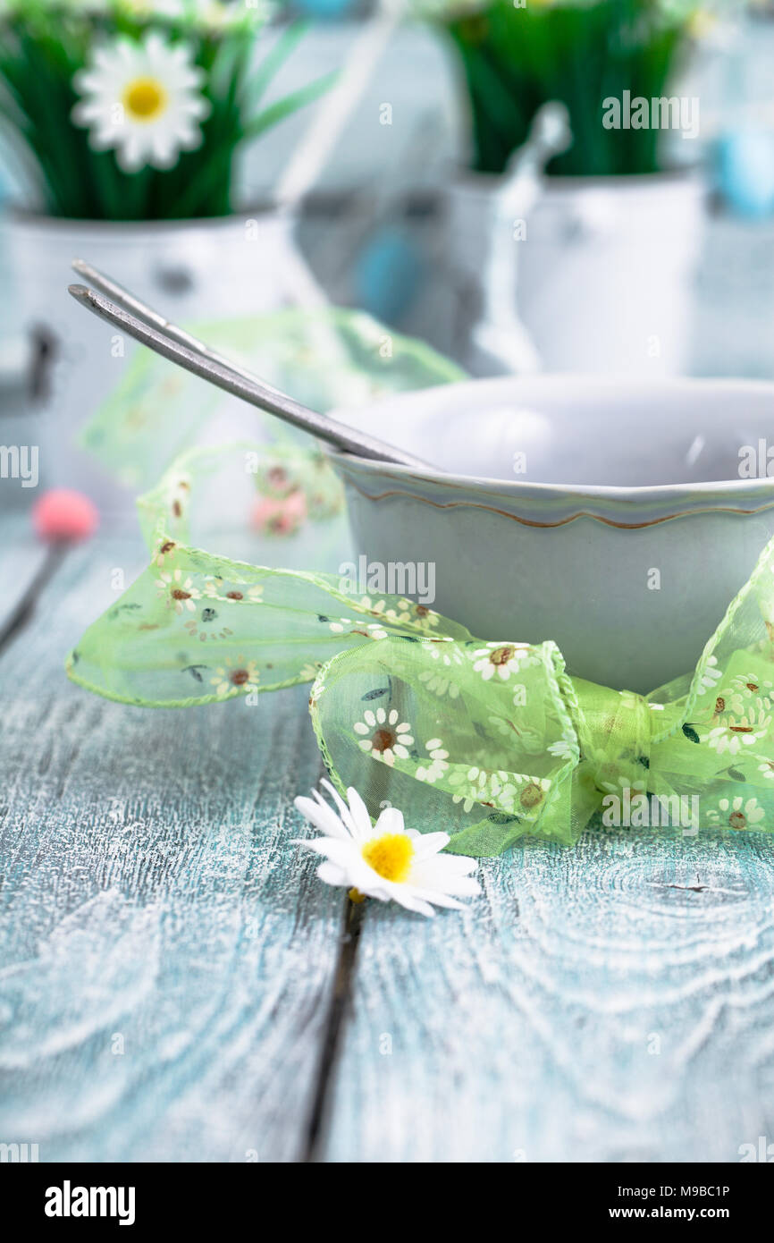 Easter table place setting. Easter table in a rustic vintage style. Stock Photo