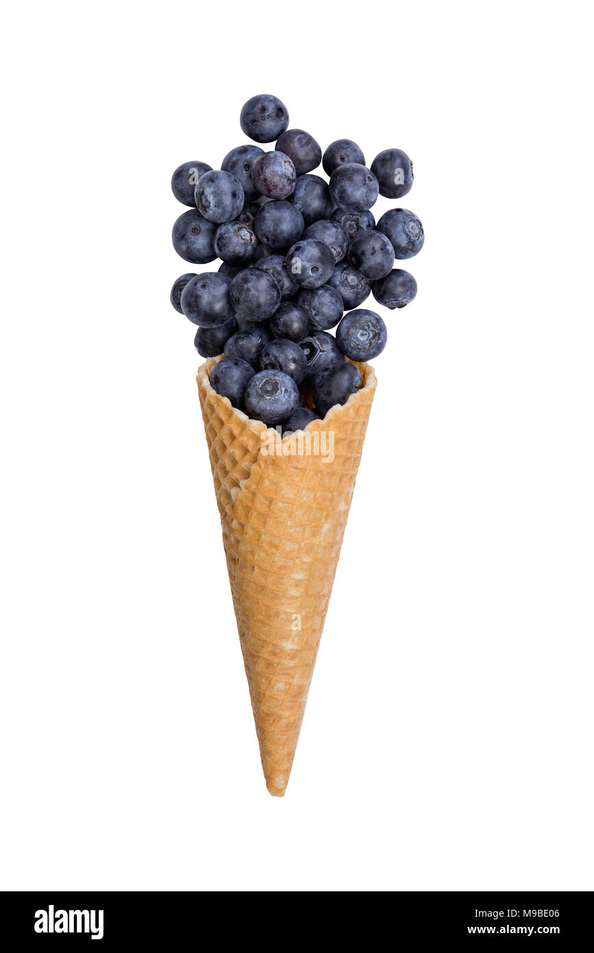 Waffle ice cream cone with fresh blueberry fruits, isolated on white ...
