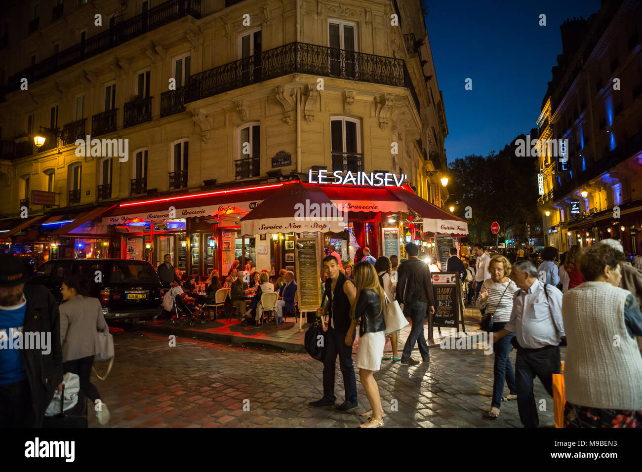 Latin Quarter of Paris, France. Narrow street of Paris among old traditional parisian houses and