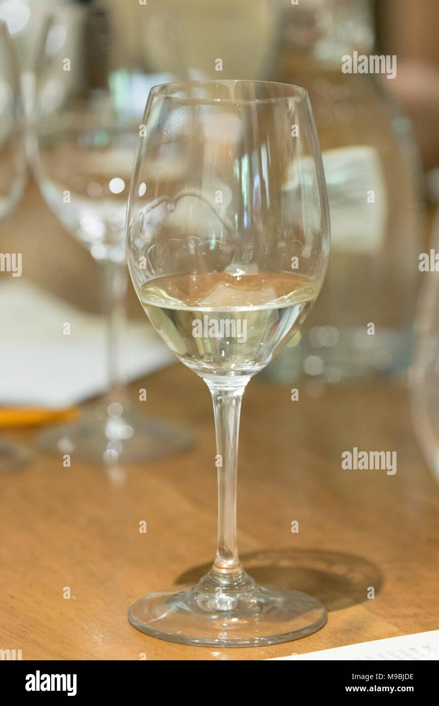 Glasses of white wine at a wine tasting Stock Photo