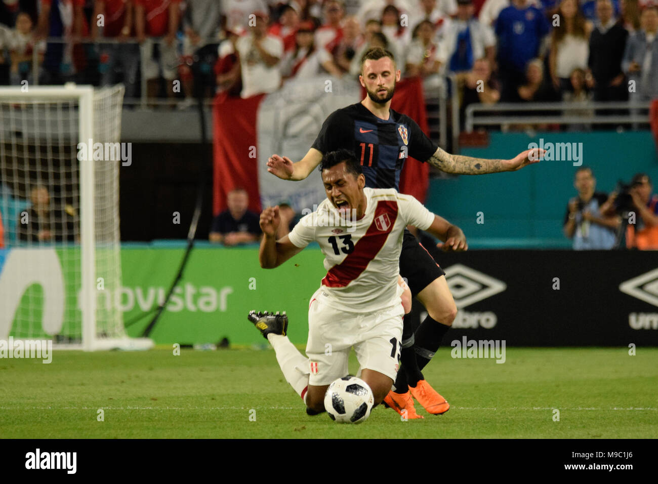 Miami, Florida, USA. 23rd Mar, 2018. Marcelo Brozovic fouls Renato Tapia on the half court.The Croatian national football team played a friendly match against Peru on 23rd March 2018. Credit: Fernando Oduber/SOPA Images/ZUMA Wire/Alamy Live News Stock Photo