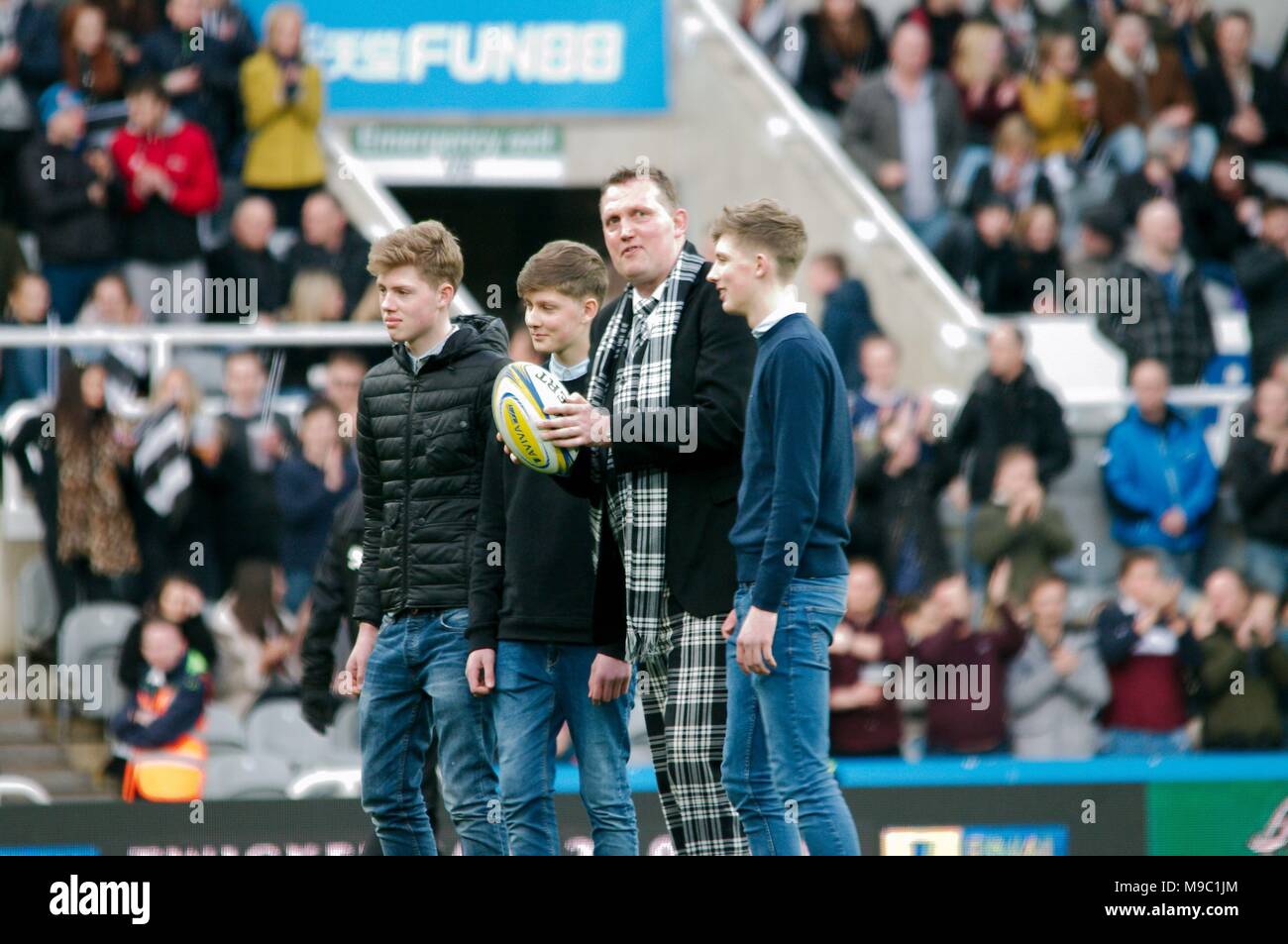 Newcastle upon Tyne, England, 24 March 2018. Doddie Weir delivering the match ball to the centre spot at St James Park before the AVIVA Premiership match between Newcastle Falcons and Northampton Saints. The match, named The Big One, raised funds for the My Name'5 Doddie Foundation. Credit: Colin Edwards/Alamy Live News. Stock Photo