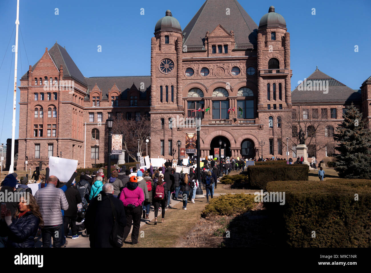 Toronto, Ontario, Canada. 24th March, 2018. Protestors calling for an end to gun violence march in Toronto, Ontario, Canada on March 24, 2018. The protest was part of the March For Our Lives moment taking place in cities across North America in response to the February shooting at Marjory Stoneman Douglas High School in Florida where 17 students were shot dead. Credit: Mark Spowart/Alamy Live News Stock Photo