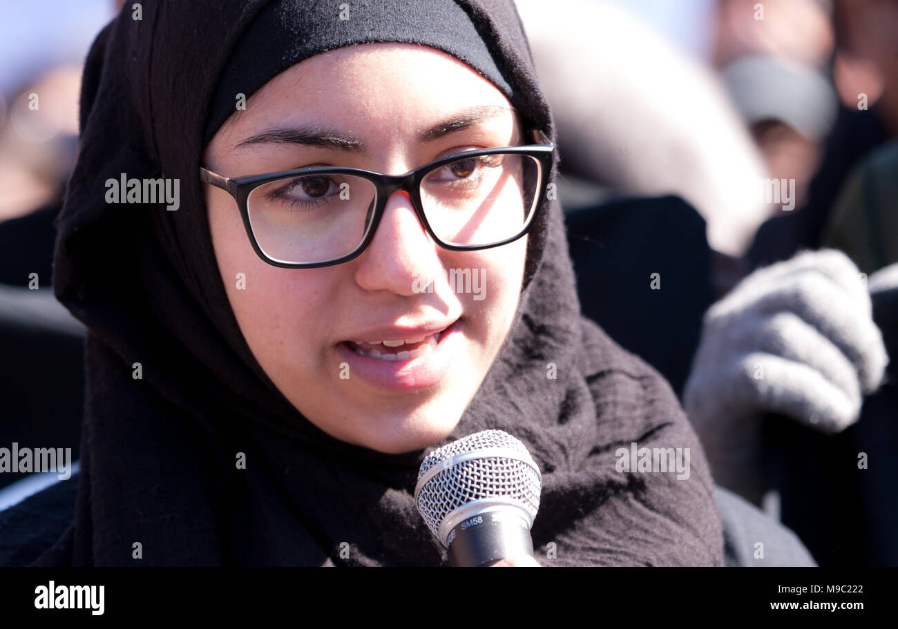 Toronto, Ontario, Canada. 24th March, 2018. Fatimah Yassine, 17, speaks to those gathered during a March For Our Lives rally in Toronto, Ontario, Canada on March 24, 2018. The protest was in response to the February shooting at Marjory Stoneman Douglas High School in Florida where 17 students were shot dead. Credit: Mark Spowart/Alamy Live News Stock Photo