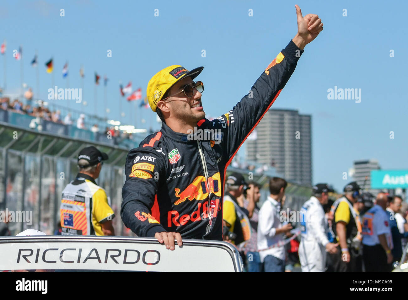 Albert Park, Melbourne, Australia. 25th Mar, 2018. Daniel Ricciardo (AUS) #3 from the Aston Martin Red Bull Racing team waves to the crowd during the drivers' parade at the 2018 Australian Formula One Grand Prix at Albert Park, Melbourne, Australia. Sydney Low/Cal Sport Media/Alamy Live News Stock Photo