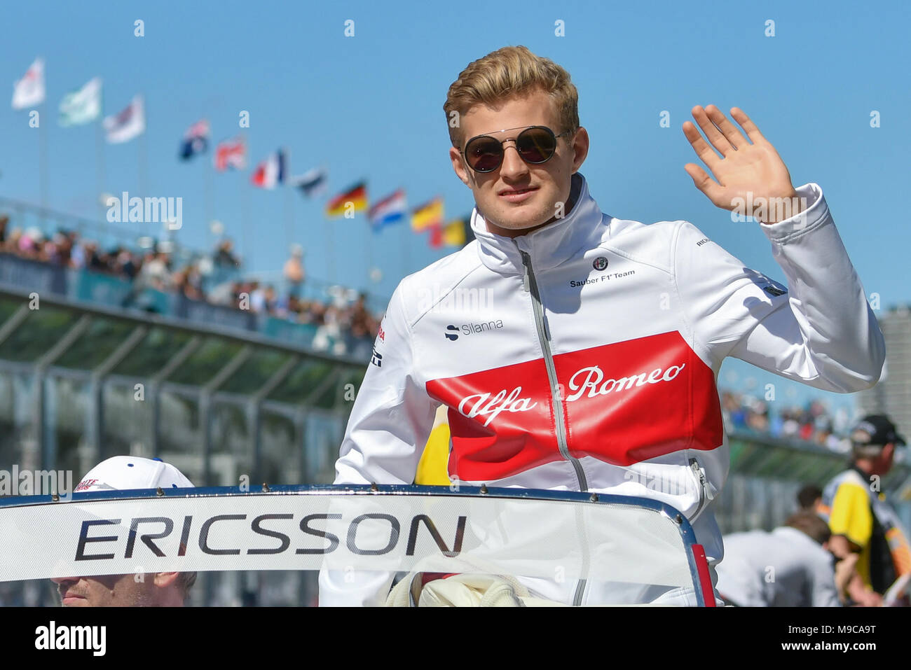 Albert Park, Melbourne, Australia. 25th Mar, 2018. Marcus Ericsson (SWE) #9 from the Alfa Romeo Sauber F1 Team waves to the crowd during the drivers' parade at the 2018 Australian Formula One Grand Prix at Albert Park, Melbourne, Australia. Sydney Low/Cal Sport Media/Alamy Live News Stock Photo