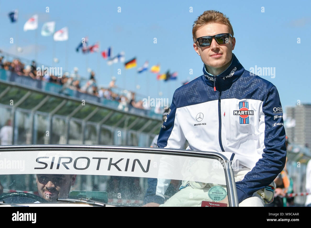 Albert Park, Melbourne, Australia. 25th Mar, 2018. Sergey Sirotkin (RUS) #35 from the Williams Martini Racing team waves to the crowd during the drivers' parade at the 2018 Australian Formula One Grand Prix at Albert Park, Melbourne, Australia. Sydney Low/Cal Sport Media/Alamy Live News Stock Photo