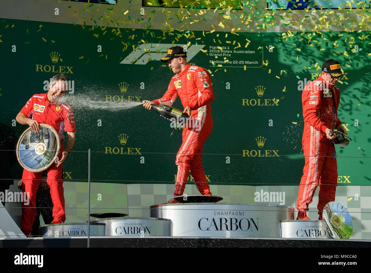 Albert Park, Melbourne, Australia. 25th Mar, 2018. Sebastian Vettel (DEU) #5 from the Scuderia Ferrari team celebrates after winning the 2018 Australian Formula One Grand Prix at Albert Park, Melbourne, Australia. Lewis Hamilton (GBR) #44 from the Mercedes AMG Petronas Motorsport team came second and Sebastian Vettel (DEU) #5 from the Scuderia Ferrari team came third. Sydney Low/Cal Sport Media/Alamy Live News Stock Photo