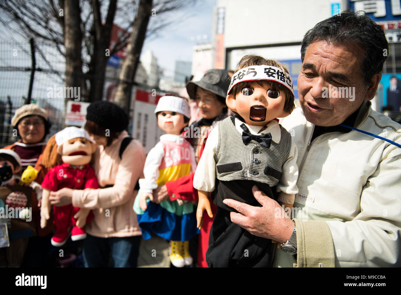 TOKYO, JAPAN - MARCH 24 : A group of puppet doll owners stage a rally to protest against the U.S base presence in Japan on March 24, 2018 in Tokyo, Japan. The protests are part of wider demonstrations on the island against the government plans to go ahead with the relocation of the US Marine Corps Air Station Futenma to the Henoko district of Nago, Okinawa Prefecture. (Photo: Richard A. de Guzman/AFLO) Stock Photo
