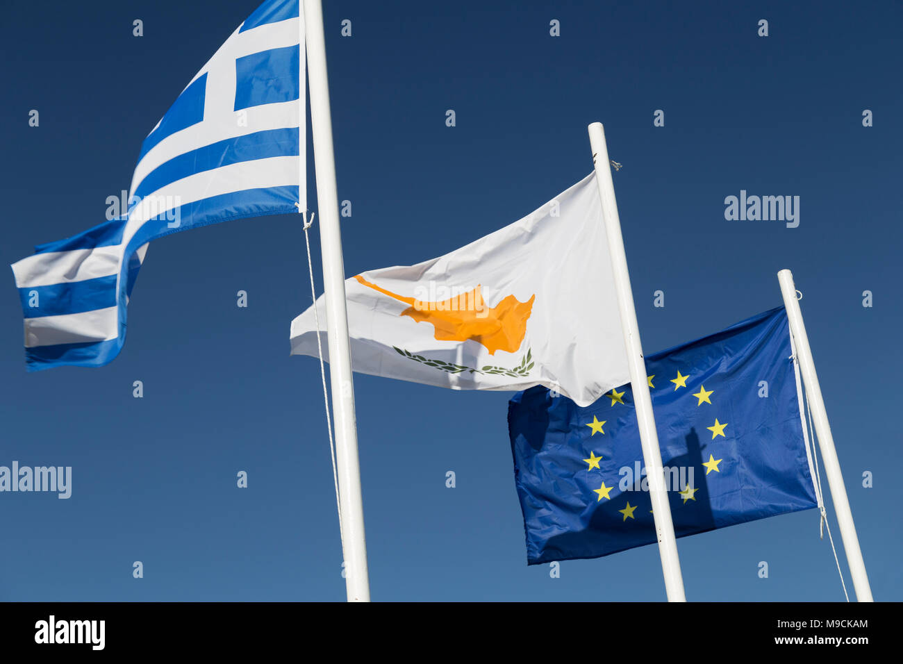 The flags of Greece, Cypus, and the European Union. Stock Photo