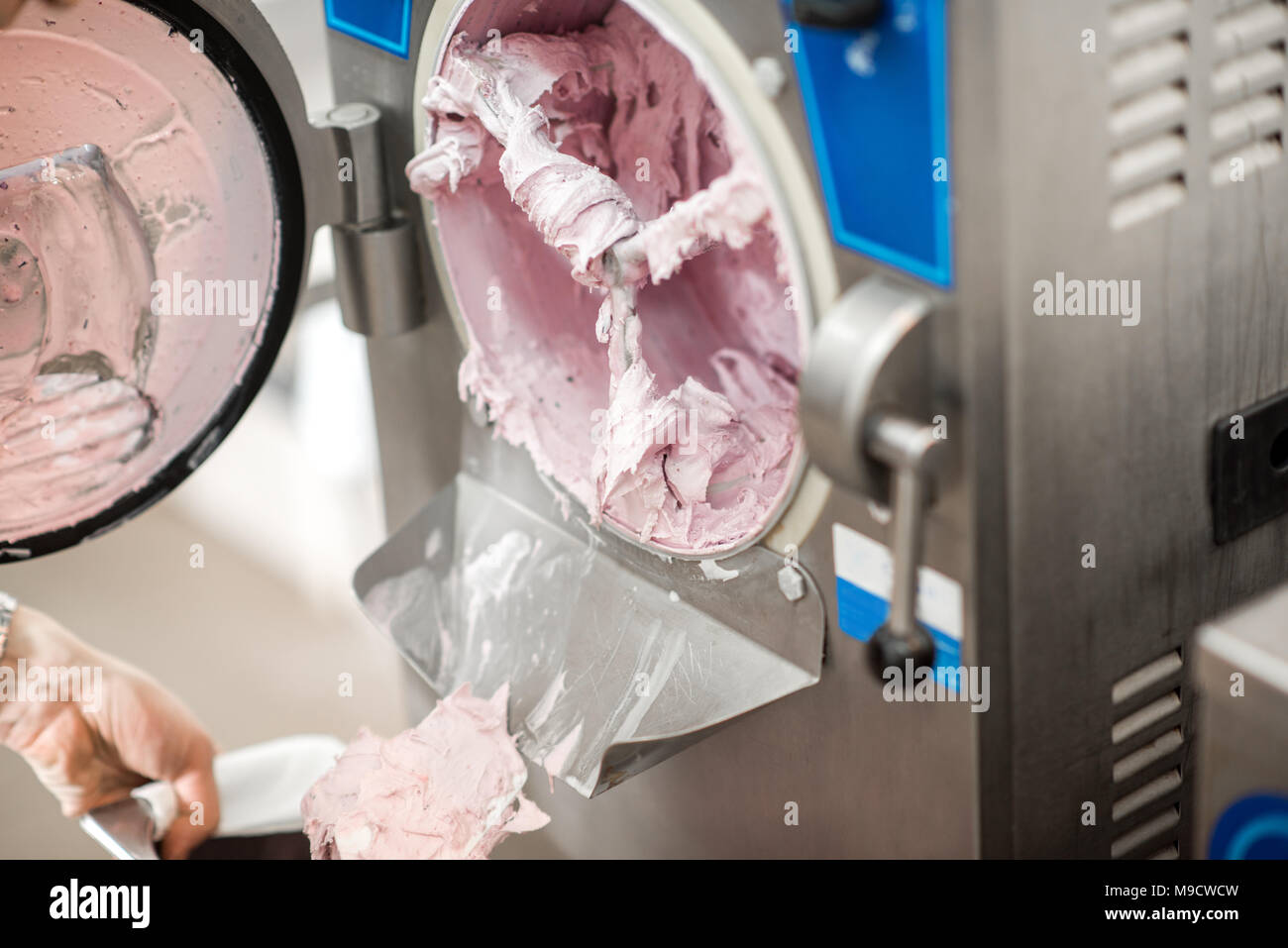 Cleaning ice cream maker machine Stock Photo