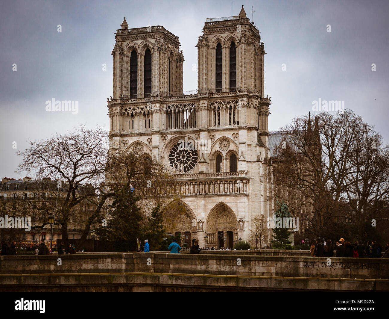 Paris, France - January 7, 2018: Notre Dame Cathedral is located in the  heart of Paris on the largest island of the Seine Stock Photo - Alamy